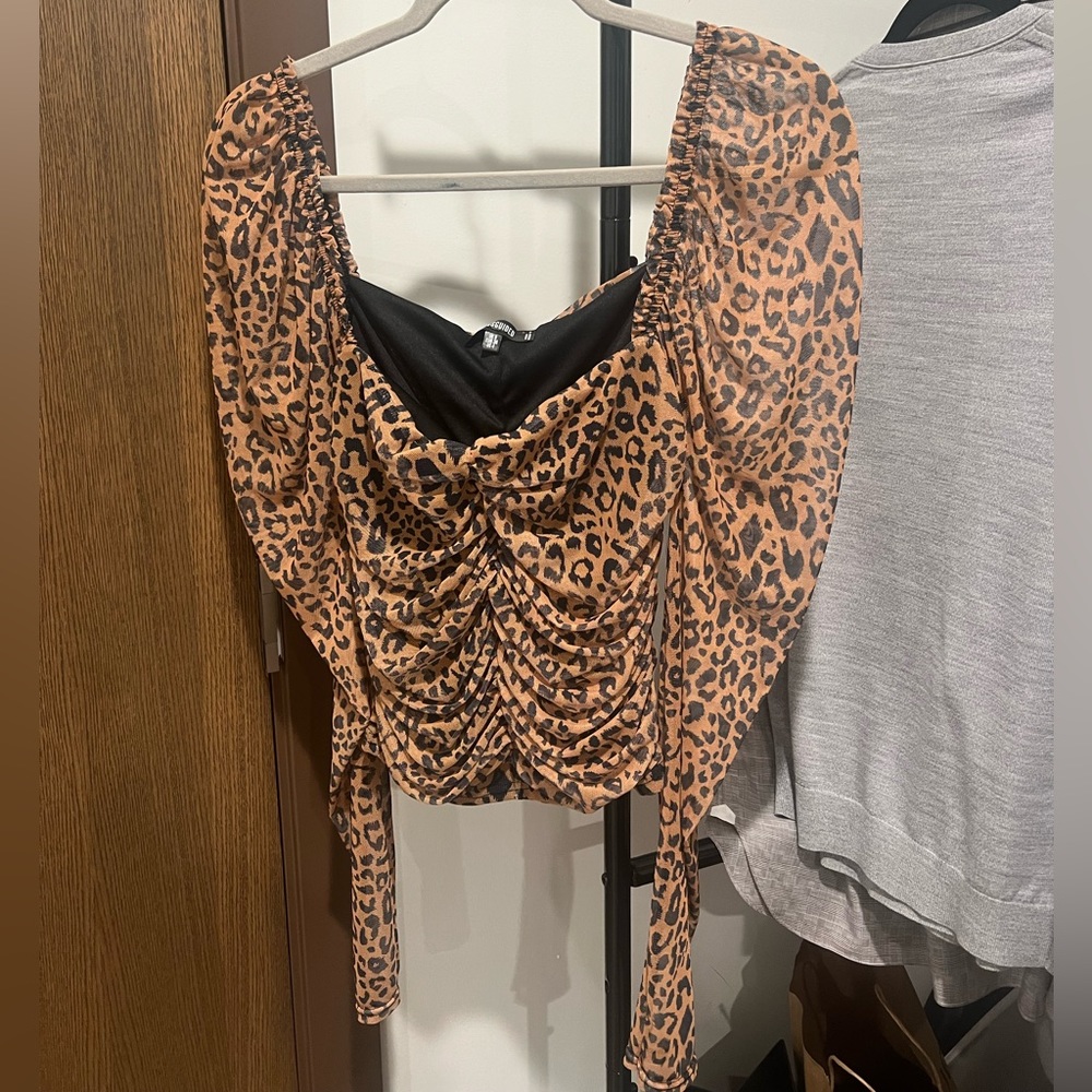 Cheetah print top.